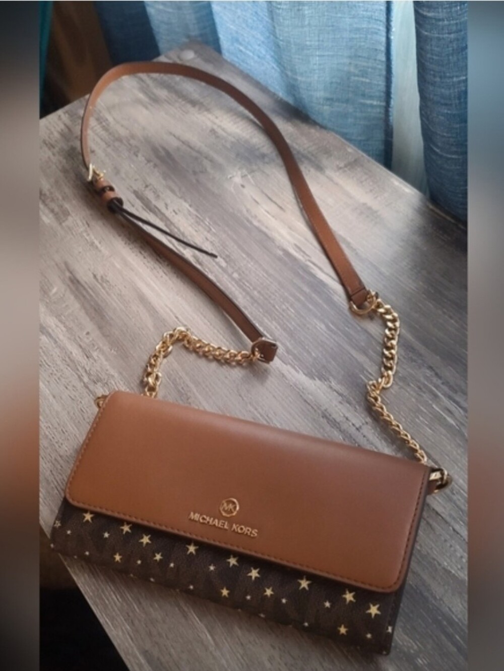 Michael Kors crossbody purse with star pattern wallet